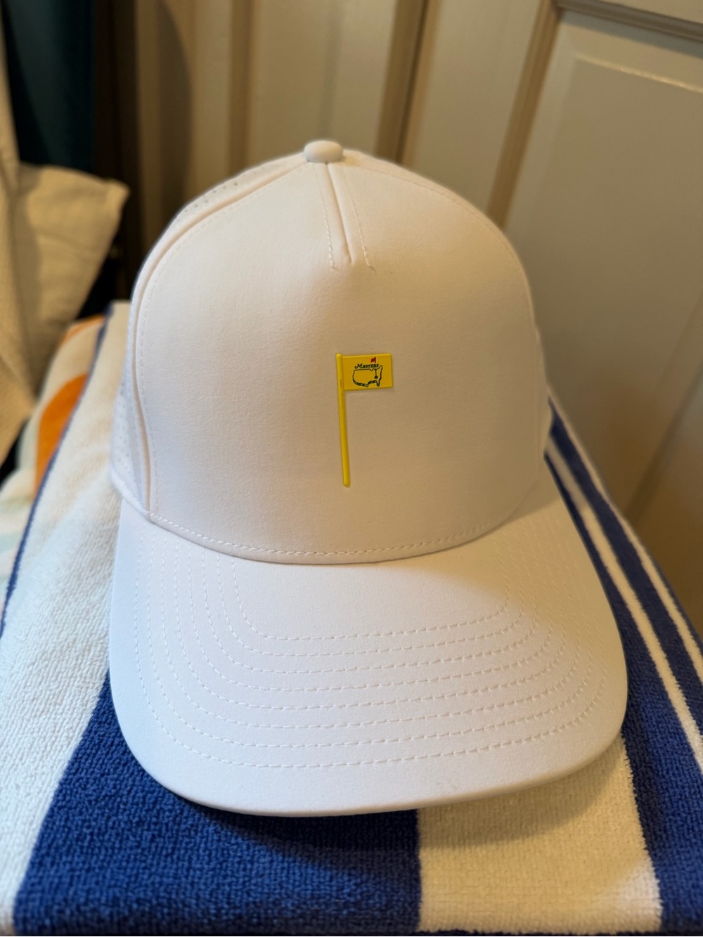 Masters White Cap with Yellow Masters Pin flag